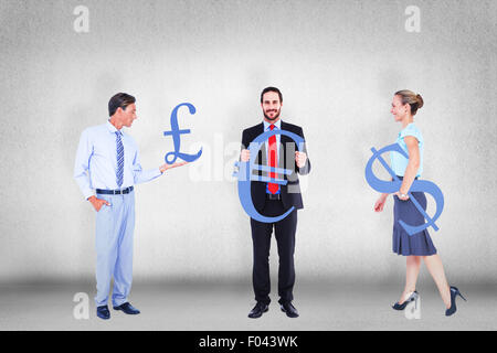 Composite image of business people holding cogs Stock Photo