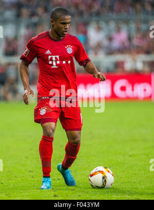 Munich, Germany. 5th Aug, 2015. Munich's Douglas Costa in action during the Audi Cup final between Bayern Munich and Real Madrid in Munich, Germany, 5 August 2015. PHOTO: MARC MUELLER/DPA/Alamy Live News Stock Photo