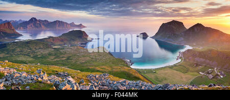 Norway. Panoramic view of  Lofoten Islands, located in Norway, taken from Holadsmelen, during summer sunset. Stock Photo