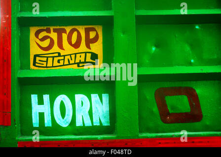 Signs on back of green lorry, Mumbai, Maharashtra, India. Stock Photo