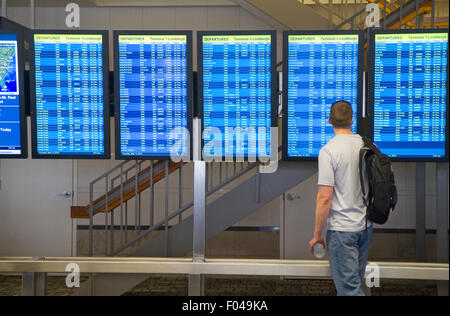 Digital flight information display monitors at the Minneapolis-Saint Paul International Airport located in Hennepin County, Minn Stock Photo