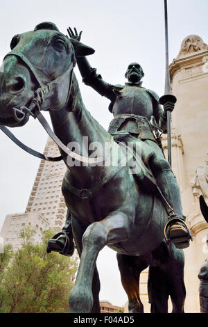 Statue of Don Quixote, knight errant, on his horse 'Rocinante' in monument to author Cervantes Saavedra, Plaza de España, Madrid Stock Photo