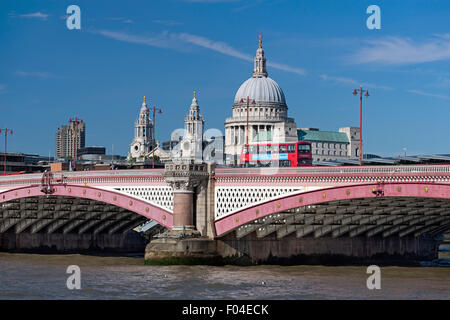 Blackfriars Bridge, St Paul's cathedral and red bus. London UK Stock Photo
