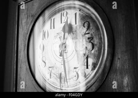 Antique grandfather clock, black and white photo, close up photo Stock Photo