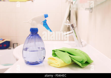 Woman doing chores in bathroom, cleaning concept Stock Photo