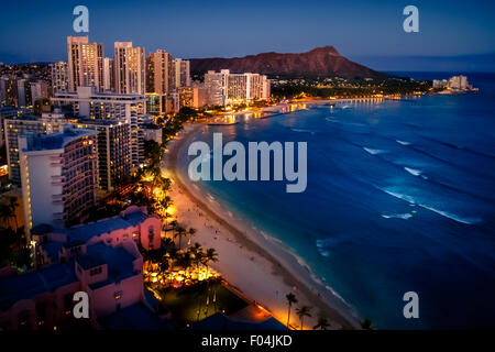 Waikiki Beach and Cityscape at Night, Honolulu, Hawaii, USA Stock Photo