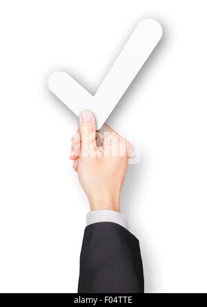 Hand of businessman holding paper tick Stock Photo