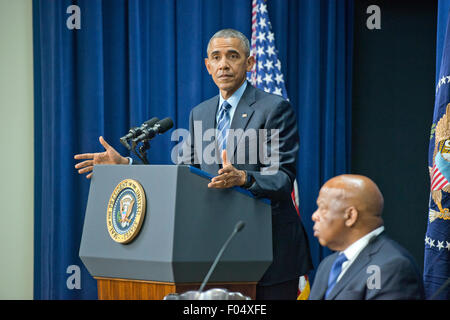 Washington DC, USA. 06th Aug, 2015. Georgia. 6th Aug, 2015. United States President Barack Obama makes remarks at a session hosted by the White House Office of Public Engagement on strengthening and protecting the right to vote at the White House in Washington, DC on Thursday, August 6, 2015. The event was attended by civil rights leaders, faith leaders, voting rights activists and state and local officials. At right is US Representative John Lewis (Democrat of Georgia.) Credit: Ron Sachs/Pool via CNP - NO WIRE SERVICE - © dpa/Alamy Live News Credit:  dpa picture alliance/Alamy Live News Stock Photo