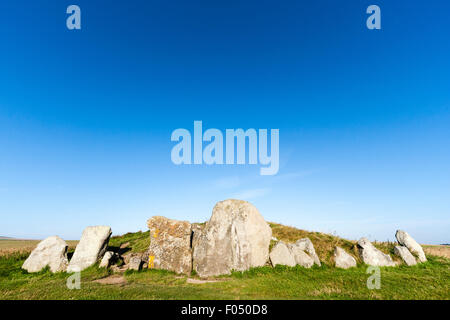 West Kennet Long Barrow, Neolithic tomb, burial mound on a chalk ridge near Silbury Hill. Large sarsen stones standing at entrance to barrow. Stock Photo