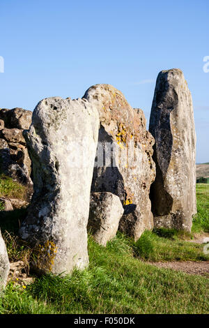 West Kennet Long Barrow, Neolithic tomb, burial mound on a chalk ridge near Silbury Hill. Large sarsen stones standing at entrance to barrow. Stock Photo