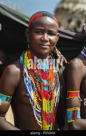 ARBORE, ETHIOPIA, 13 AUGUST:unidentified young woman from Arbore tribe in Arbore, Ethiopia, on 13 august 2014. Arbore women use Stock Photo