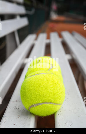 Tennis balls ready for play on the tennis court. Stock Photo