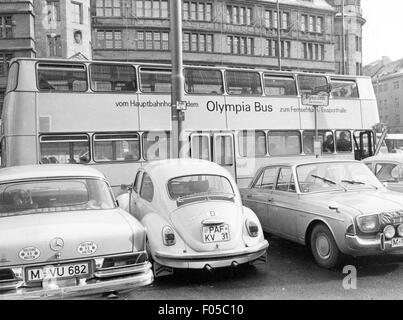 geography / travel,Germany,Munich,transport / transportation,public local traffic,Olympia Bus,direct connection from the Central Station to the Olympic Area,stop at Bahnhofsplatz,1970,double decker,double-decker bus,double deckers,double-decker buses,double-decker busses,public local traffic,bus stop,bus stops,tourism,touristic,cars,car,Volkswagen,VW beetle 1500,Mercedes-Benz W 110,Mercedes Benz W110,people,Bavaria,West Germany,Western Germany,Germany,1970s,70s,20th century,transport,transportation,connection,connexion,conne,Additional-Rights-Clearences-Not Available Stock Photo
