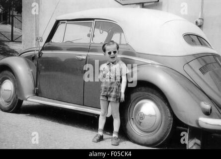 transport / transportation, car, cars / vehicle variants, Volkswagen, VW beetle, small boy in front of a convertible edition, Germany, 1950s, Additional-Rights-Clearences-Not Available Stock Photo