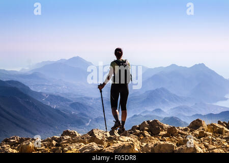 tourist woman on the top of mount Stock Photo