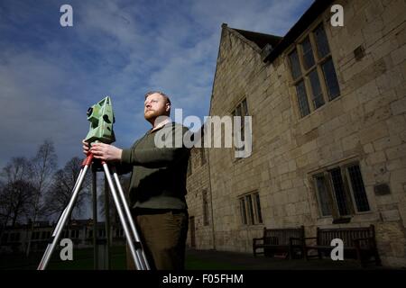 archaeology student with mapping device Stock Photo