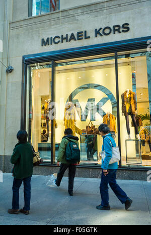 New York City, USA, Small Group People, Street Scenes Shopping on Fifth Avenue, Luxury Fashion Brands, Michael Kors Store Window Stock Photo