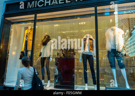 New York City, USA, Street Scenes, Woman Walking, Shopping on Fifth Avenue, Luxury Fashion Brands, 'Michael Kors' Shop Front Window, garment shops exterior Stock Photo