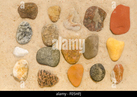 pebbles composition sand  background Stock Photo