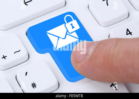 Sending encrypted secure E-Mail email mail message on computer Stock Photo