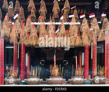 Burning incense at Chua Ba Thien Hau Temple,Saigon, Vietnam Stock Photo