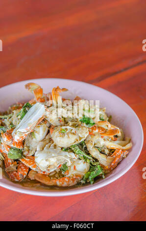 Stir fried Crab with chili & Basil leaves , spicy seafood dish Stock Photo