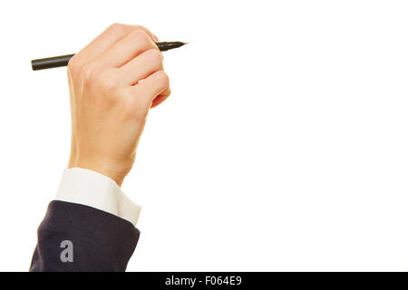 Business man holding black pen sideways Stock Photo