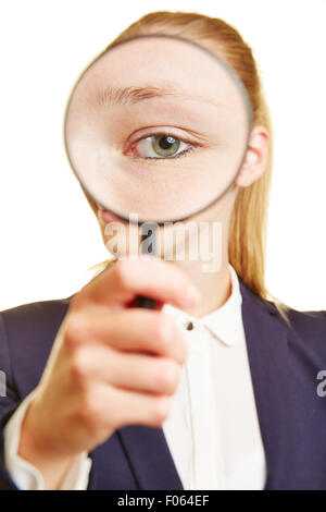 Businesswoman looking through magnifying glass Stock Photo - Alamy