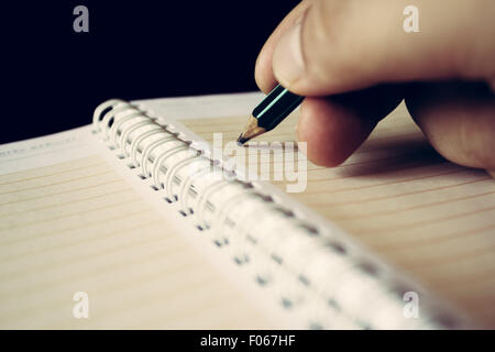 Man starting to write something Stock Photo