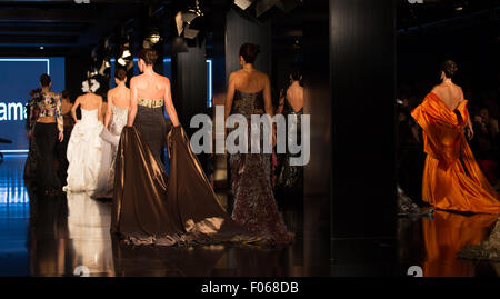 ISTANBUL, TURKEY - NOVEMBER 21, 2014: Models showcase the latest creations by Priamos in Fashionist fashion fair