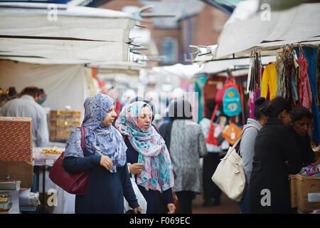 Longsight market in Manchester Uk  Shop shopping shopper store retail supermarket retailer retailers traders trading outlet buyi Stock Photo