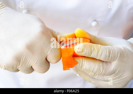 Chef Carving Carrot Stock Photo