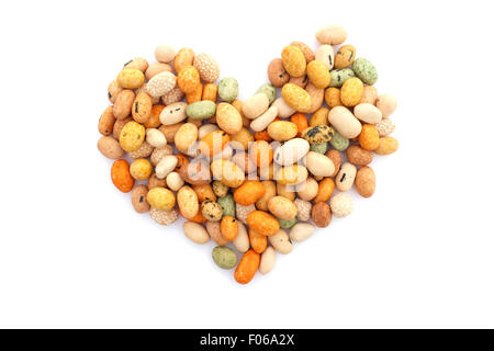 Seaweed peanuts in a heart shape, isolated on a white background Stock Photo