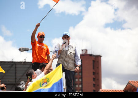 Caracas, Venezuela. 8th Aug, 2015. The President of the Movement of Democratic Unity (MUD) Jesus 'Chuo' Torrealba (R) speaks during a peaceful protest against the inflation, shortages and recession, in Caracas, Venezuela, on Aug. 8, 2015. © Boris Vergara/Xinhua/Alamy Live News Stock Photo