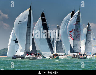 Cowes, Isle of Wight, UK, Saturday, 8 August 2015. Aberdeen Asset Management Cowes Week gets under way with IRC Class 0 Yachts crossing the start line. Credit:  Sam Kurtul / Alamy Live News Stock Photo