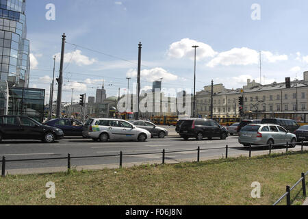 Blue sky view, from Ratusz Arsenal Metro Station, cars on aleja Solidarnosci queuing at plac Bankowy intersection, Warsaw Stock Photo