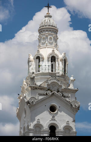 National Cathedral on Plaza Grande in front of the Presidential Palace in Quito with a cloudy blue sky in the background. Stock Photo