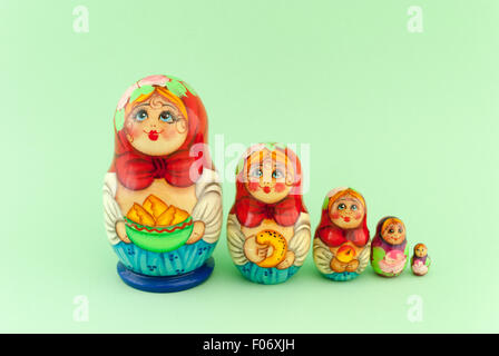 Russian dolls matryoshka on green background Stock Photo