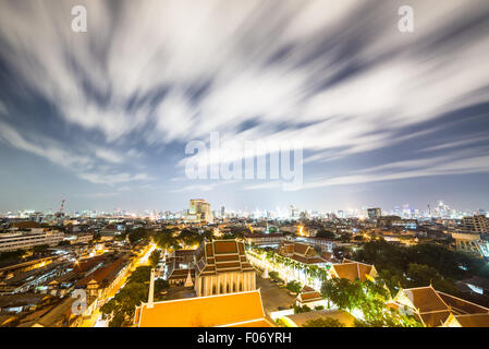 Fast clouds above Bangkok cityscape capture with long exposure and wide angle. Bangkok is Thailand capital city and this view is Stock Photo