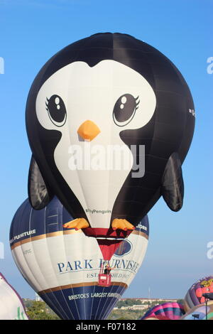 Penguin and other balloons at Bristol International Balloon Fiesta Stock Photo
