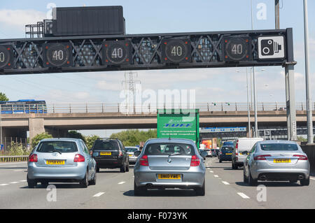 Traffic jam and speed restrictions on M25 Motorway, Surrey, England, United Kingdom Stock Photo