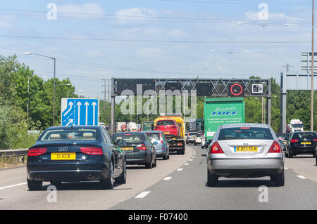 Traffic jam and speed restrictions on M25 Motorway, Surrey, England, United Kingdom Stock Photo