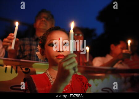 Dhaka, Bangladesh. 8th August, 2015. Indigenous People of Bangladesh celebrate the International Day of the World's Indigenous People 2015 by Lighting thousand candles at the Central Shahid Minar  in Dhaka on August 8, 2015.  This year United Ntions make slogan for ths day is 'Ensuring indigenous peoples' health and well-being'. Credit:  zakir hossain chowdhury zakir/Alamy Live News Stock Photo