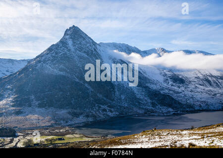 High view across Ogwen Valley to Mount Tryfan mountain peak and Glyderau mountains from Carneddau in winter. Snowdonia National Park Wales UK Stock Photo