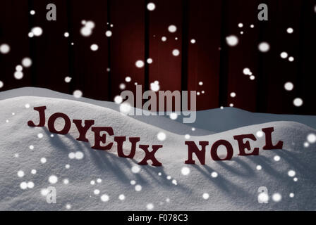 Joyeux Noel Means Merry Christmas With Snowflakes Stock Photo