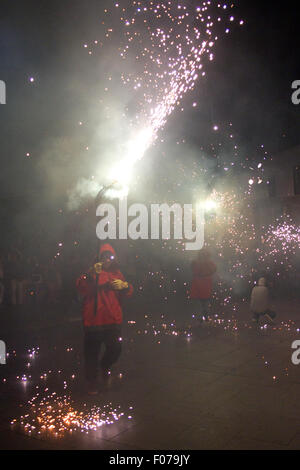 Fire devils in the Fire-Run (Correfoc) traditional celebration in the Raval neighborhood in Barcelona Stock Photo