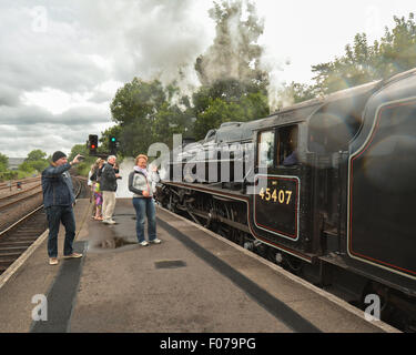 Seeing off friends and family on a nostalgic steam train journey on the Jacobite, from Fort William to Mallaig - Scotland, UK Stock Photo