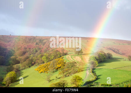 Rainbows over the Punchbowl on Winsford Hill near Winsford, Exmoor National Park, Somerset, England, UK Stock Photo