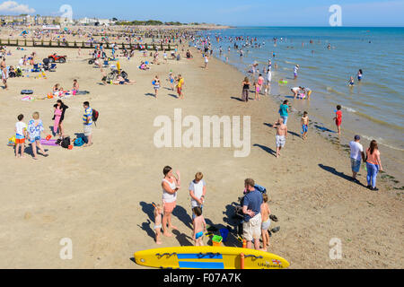 Busy 'Blue Flag' beach on a sunny day at Littlehampton, West Sussex, England, UK. Stock Photo