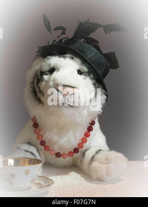 Portrait of a Dressed Up Stuffed Animal Having Tea, USA Stock Photo